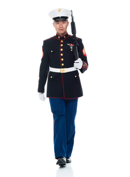 istock US Marine in uniform holding rifle 951322822