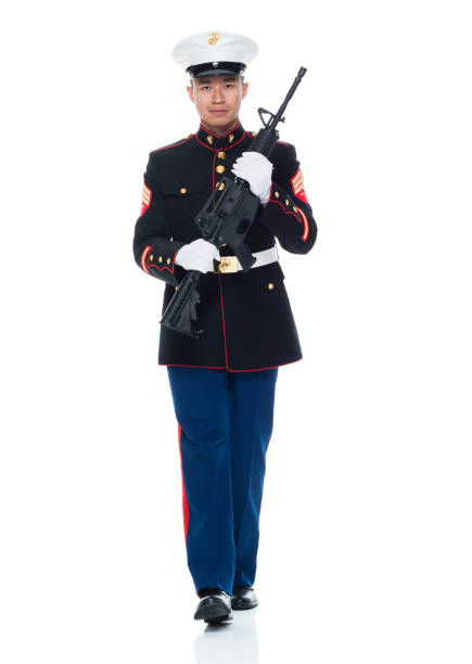 istock US Marine in uniform holding rifle 951322926