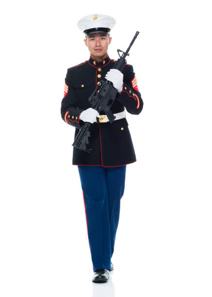 istock US Marine in uniform holding rifle 951322942