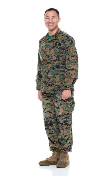 istock US Marine in uniform standing with hands by side 951325368