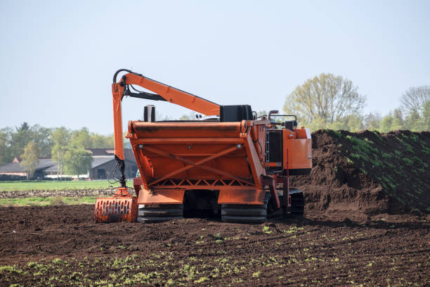 istock Special  machine for peat extraction, raised bog in the Venner Moor, Lower Saxony, Germany 951325460
