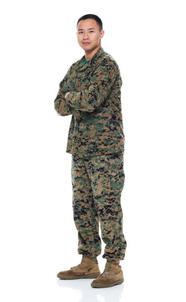 istock US Marine in uniform with arms crossed 951325822