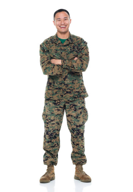 istock US Marine in uniform with arms crossed 951326006