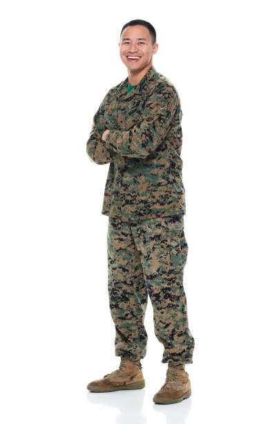 istock US Marine in uniform with arms crossed 951326030