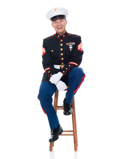 istock US Marine in uniform sitting on stool 951326238