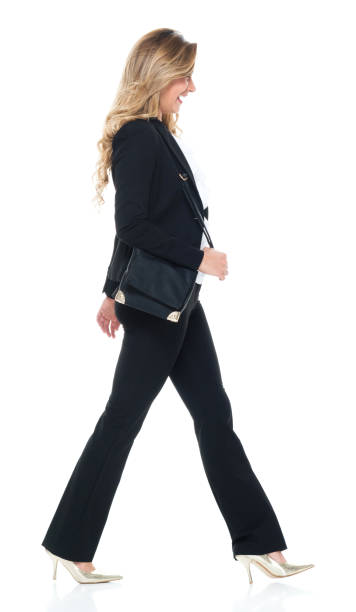 istock Attractive business woman walking 951349294