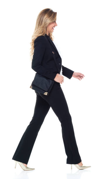 istock Attractive business woman walking 951349446
