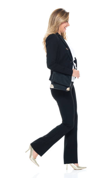 istock Attractive business woman walking 951349452