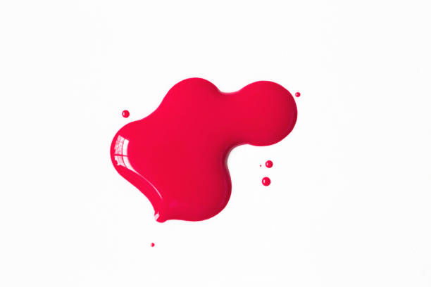 fuschia nail polish splatter on white background - paint drops imagens e fotografias de stock