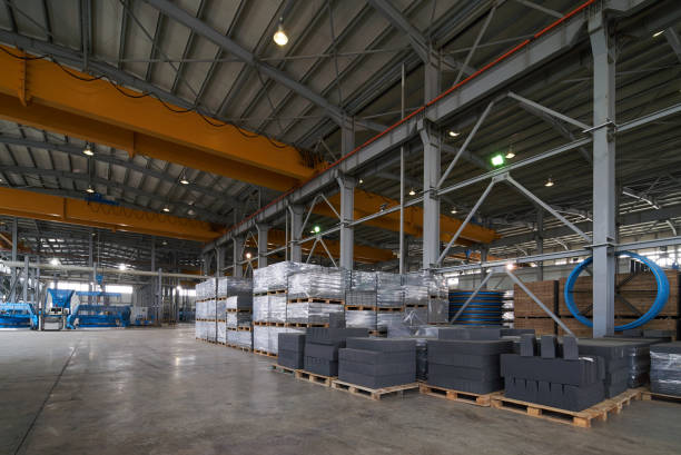 istock Large Warehouse interior inside a Factory building 951356420