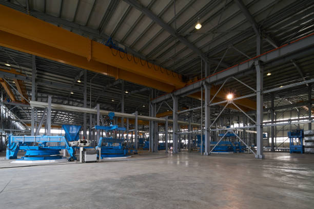 istock Large Warehouse interior inside a Factory building 951356480