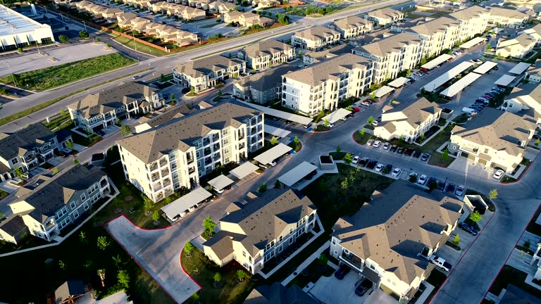 Apartment Complex New Development aerial drone view at Sunset