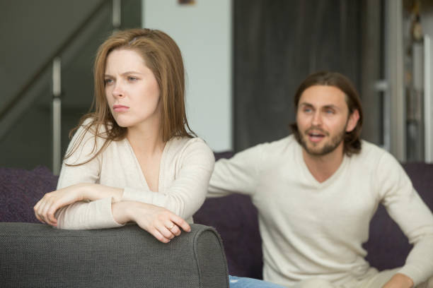 istock Couple arguing, offended affronted woman ignoring man shouting at her 951363820