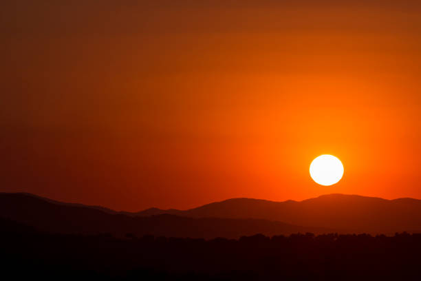 istock Silhouette of mountains at sunset 951364360