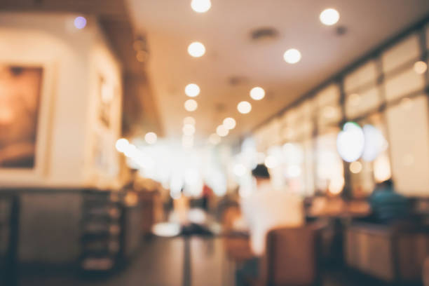 istock Restaurant cafe or coffee shop interior with people abstract defocused blur background 951367374