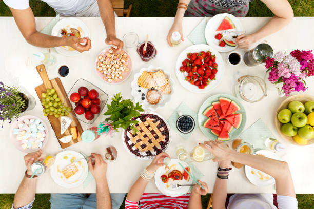 istock Friends having meal outside 951367816
