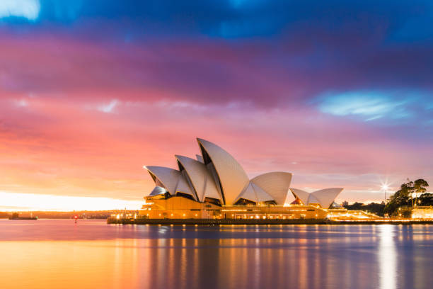 Sydney Opera House Dawn Sydney, Australia - Melbourne 25, 2018: Sydney Opera House view with the light on at dawn. sydney photos stock pictures, royalty-free photos & images