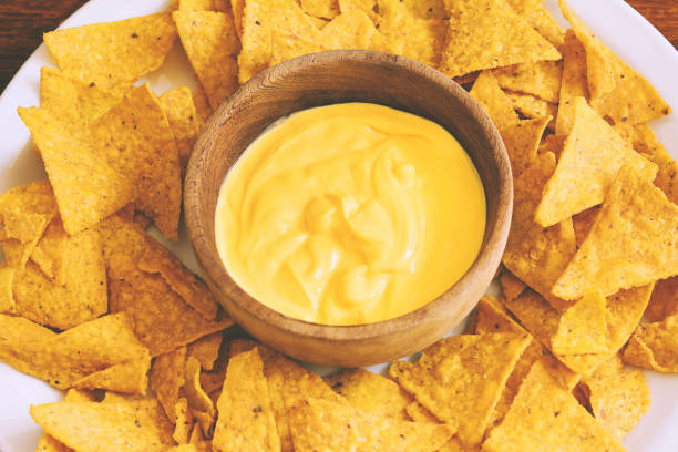 istock Top view of nachos with cheese dip 951378784
