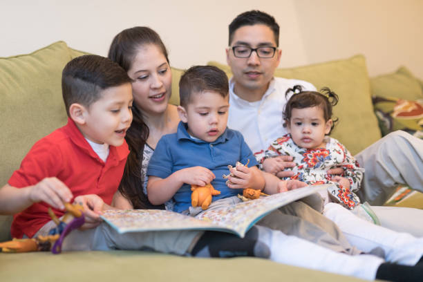 istock Family relaxing at home on the couch 951385212