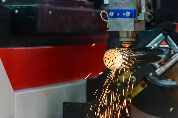 istock The CNC fiber laser cutting machine cut the  stainless pipe 951386344
