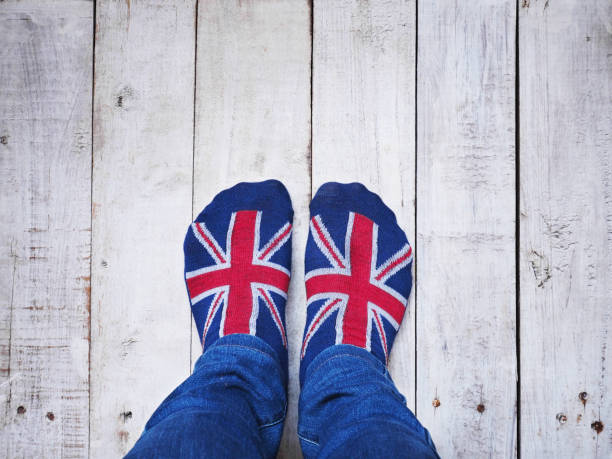 istock Selfie feet wearing socks with British flag pattern 951389640