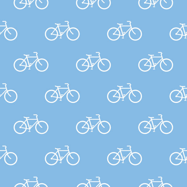 Bicycles Seamless Pattern Vector seamless pattern of white bicycles on a light blue background. bicycle backgrounds stock illustrations