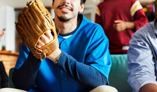 istock Friends cheering sport league together 951402454