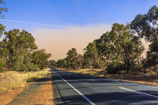 Approaching a dust storm while driving along the Goldfields Way between Wagga Wagga and Temora, New South Wales