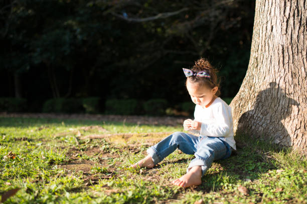 istock Teddy bear and little girl 951405632
