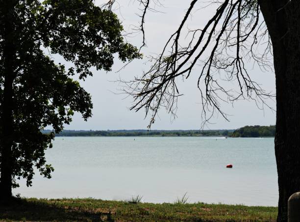 Lake Murray on cloudless day seen from the eastern side, Oklahoma Lake Murray State Park is known to be the oldest and largest state park in Oklahoma. lake murray stock pictures, royalty-free photos & images