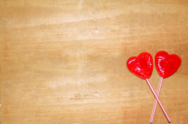 istock lollipop on wood 951410500