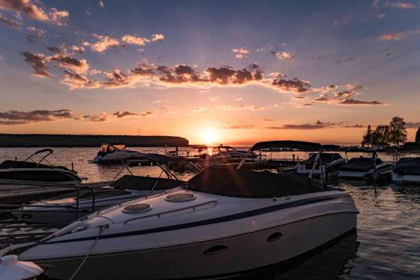 istock Docked Speed Boats Sunset 951416356