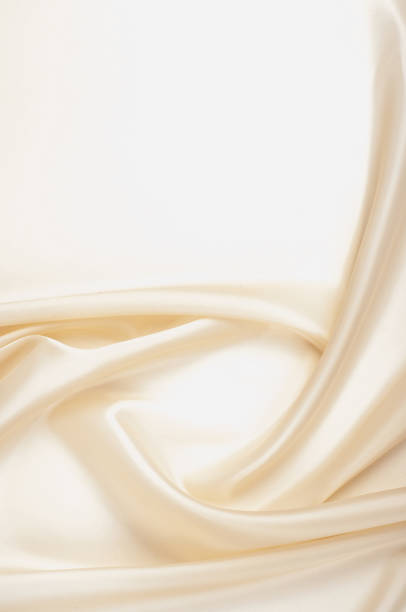 istock tissue, textile, cloth, fabric, material, texture. beige color 951422612