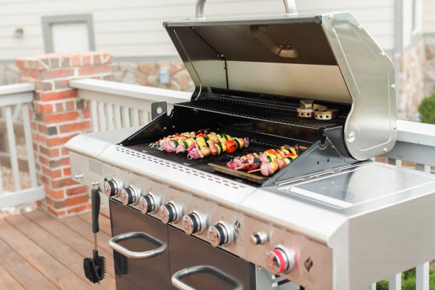 istock Grilling veggie skewers and chicken kebabs 951426280