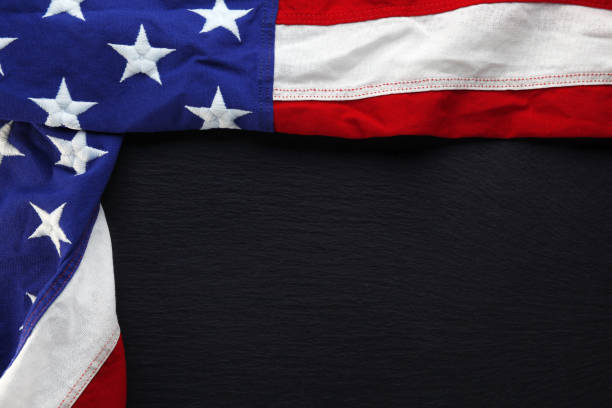 istock USA flag on black slate background 951427008