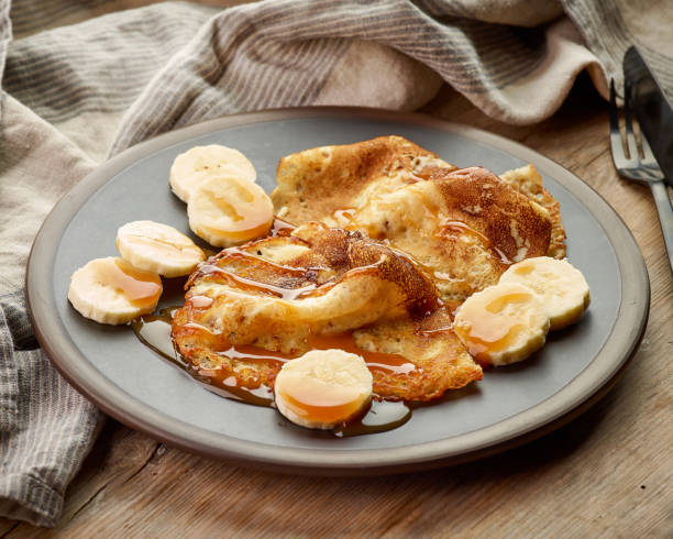 istock Crepes with banana and caramel sauce 951427184