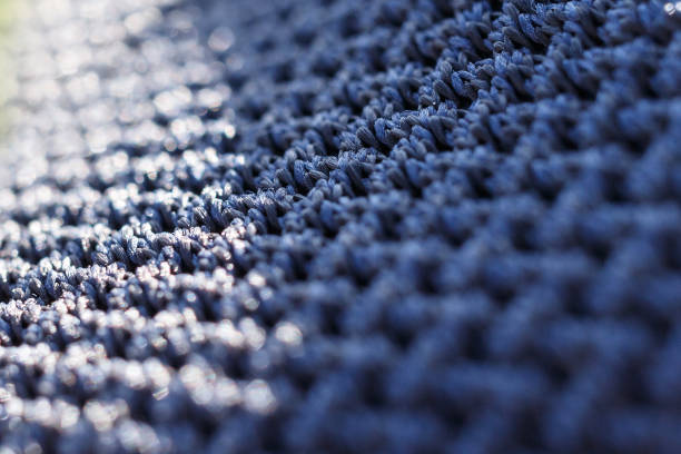 糸のクローズ アップ。編まれた繊維のクローズ アップ。テクスチャ繊維。編み糸のテクスチャー。自然な生地の質感。 - wool close up knitting fiber ストックフォトと画像