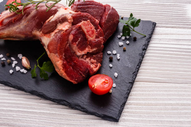 istock fresh lamb meat on a textured stone plate 951431246
