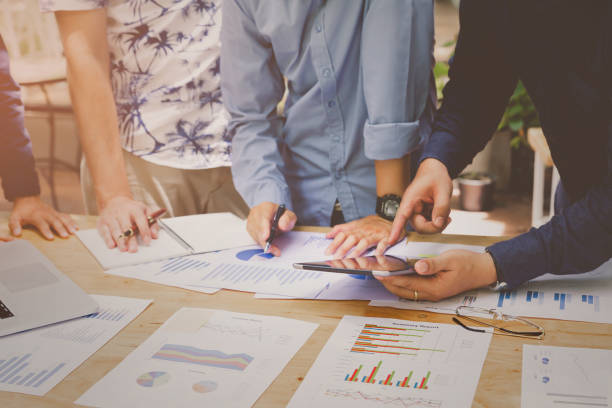 istock Team Meeting Brainstorming Planning Analyzing Concept.startup business people group working at home office.Start up concept. 951432354