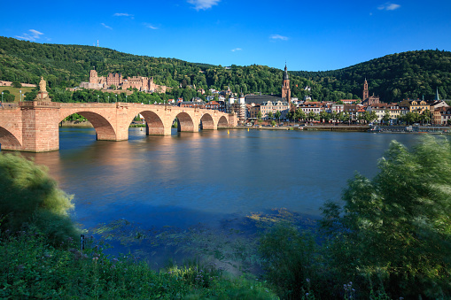 Cityscape of the German city of Heidelberg with old bridge and castle from Philosophers Walk