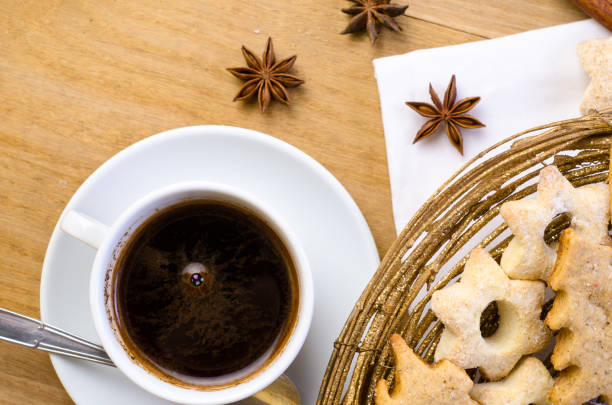 istock Cup of coffee with Christmas cookies 951441606