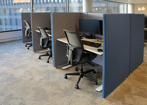 Empty office chairs in a row