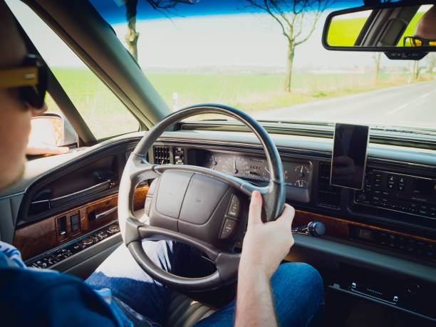 istock Driving a vintage car 951451910