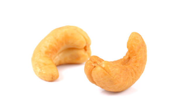 istock Fried cashew nut closeup isolated on white 951452290