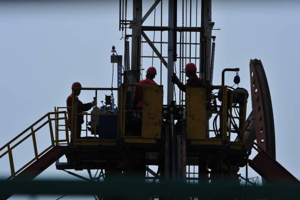 istock The oil workers in the job 951452338