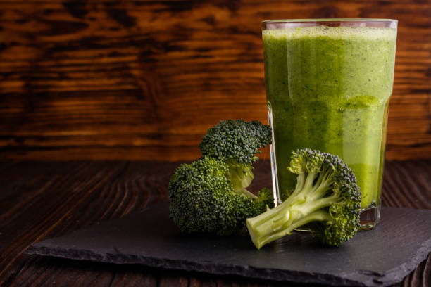 istock fresh broccoli juice on a wooden background 951452738