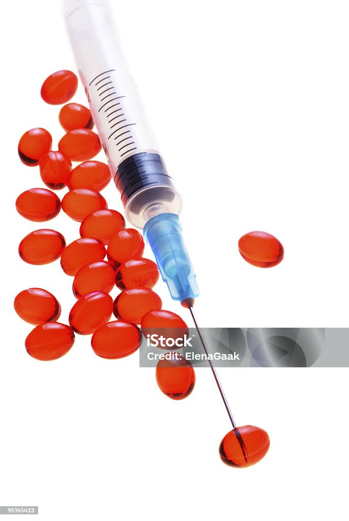 Siringa e pillole - Foto stock royalty-free di Antiossidante