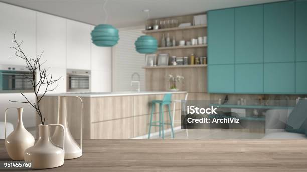 Wooden Table Top Or Shelf With Minimalistic Modern Vases Over Blurred Minimalistic Turquoise Kitchen White Interior Design Stock Photo - Download Image Now