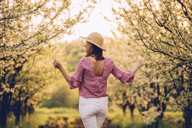 istock Girl enjoying in orchard 951466898