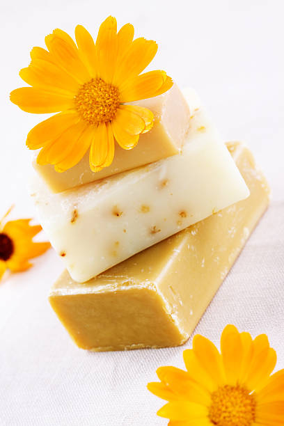 istock Natural soap with marigold flowers close up 95147121
